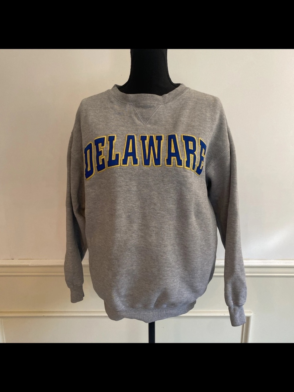 Champs Grey Crewneck Sweatshirt with Blue and Yellow Delaware Lettering